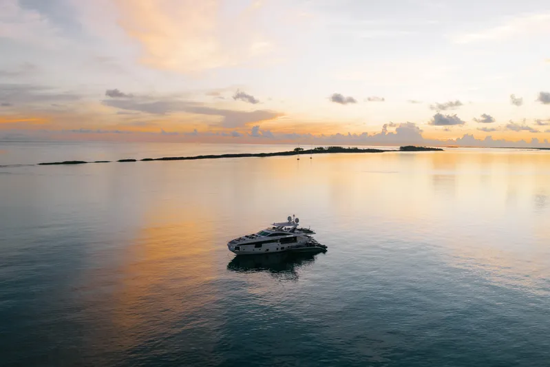 Carpe Diem Yacht Photos Pics Luxury Azimut yacht on tranquil waters at sunset, 2023.