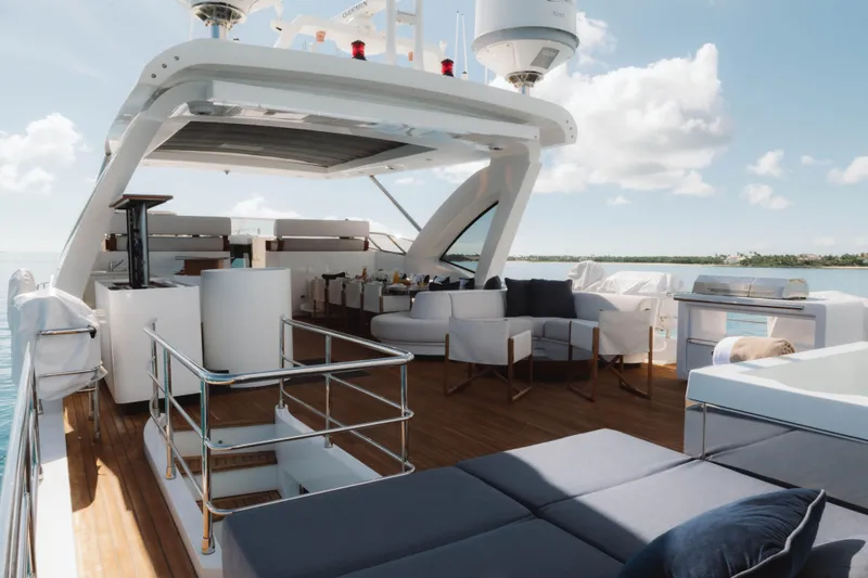 Carpe Diem Yacht Photos Pics Luxurious 2023 Azimut yacht deck with elegant seating and ocean view.