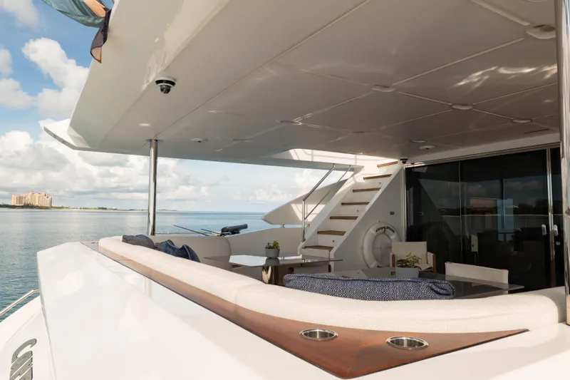 Carpe Diem Yacht Photos Pics Luxurious 2023 Azimut yacht deck with seating, ocean view, and modern design.