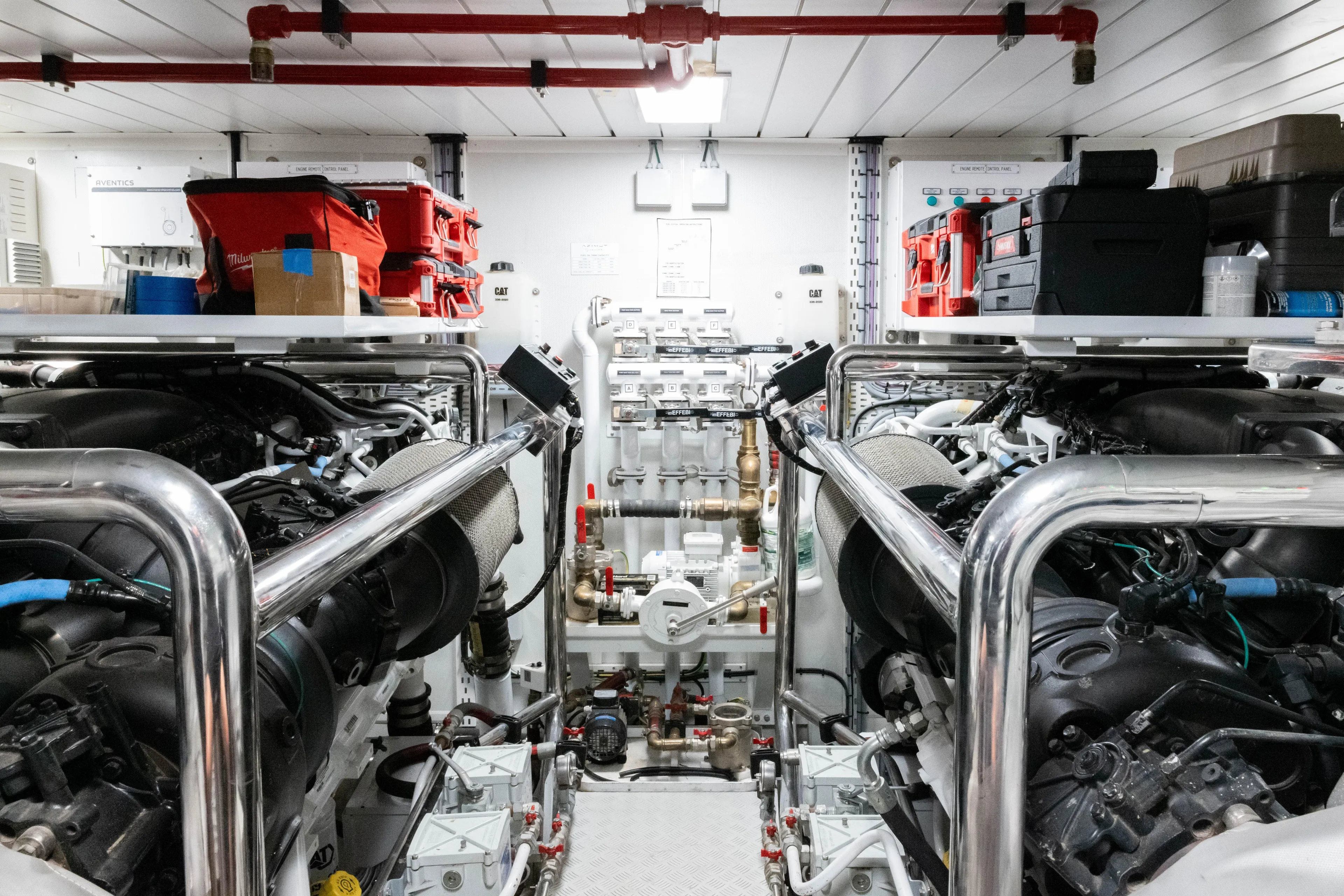 Carpe Diem Yacht Photos Pics Engine room of a 2023 Azimut yacht, featuring advanced machinery and organized storage.