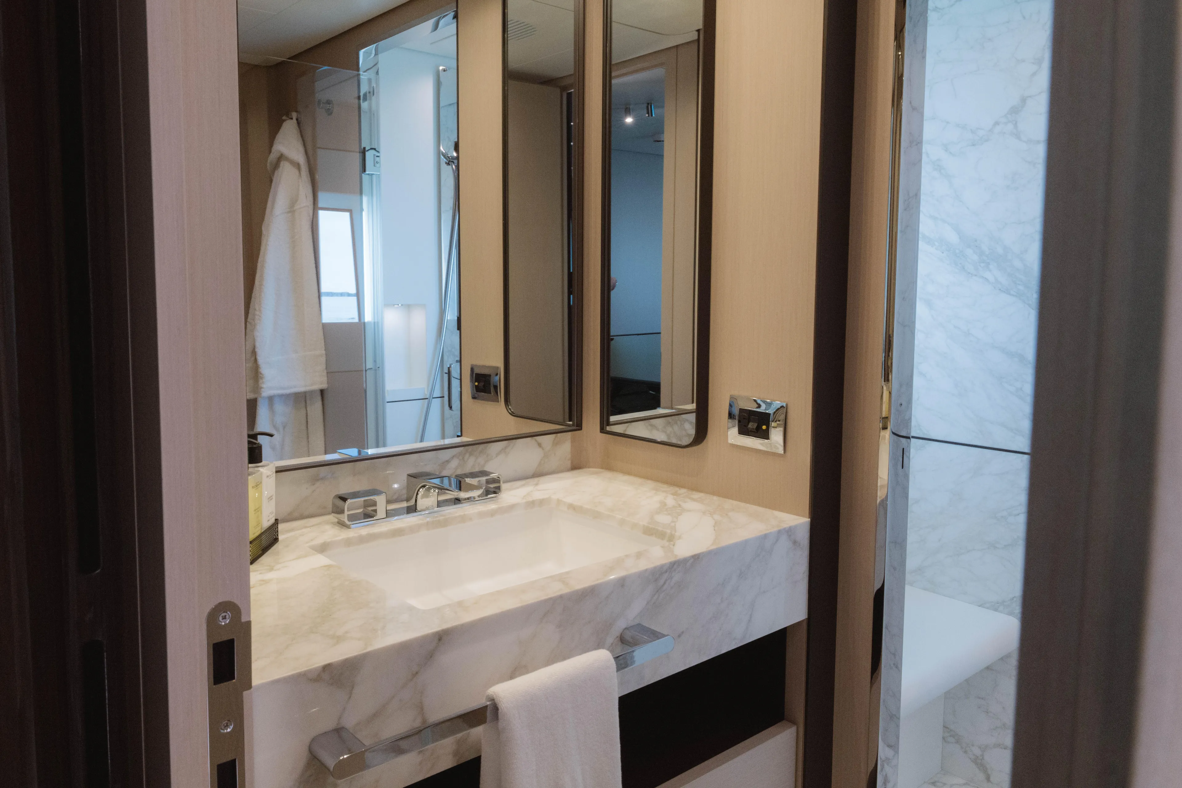 Carpe Diem Yacht Photos Pics Luxurious 2023 Azimut yacht bathroom with marble sink, modern fixtures, and elegant design.