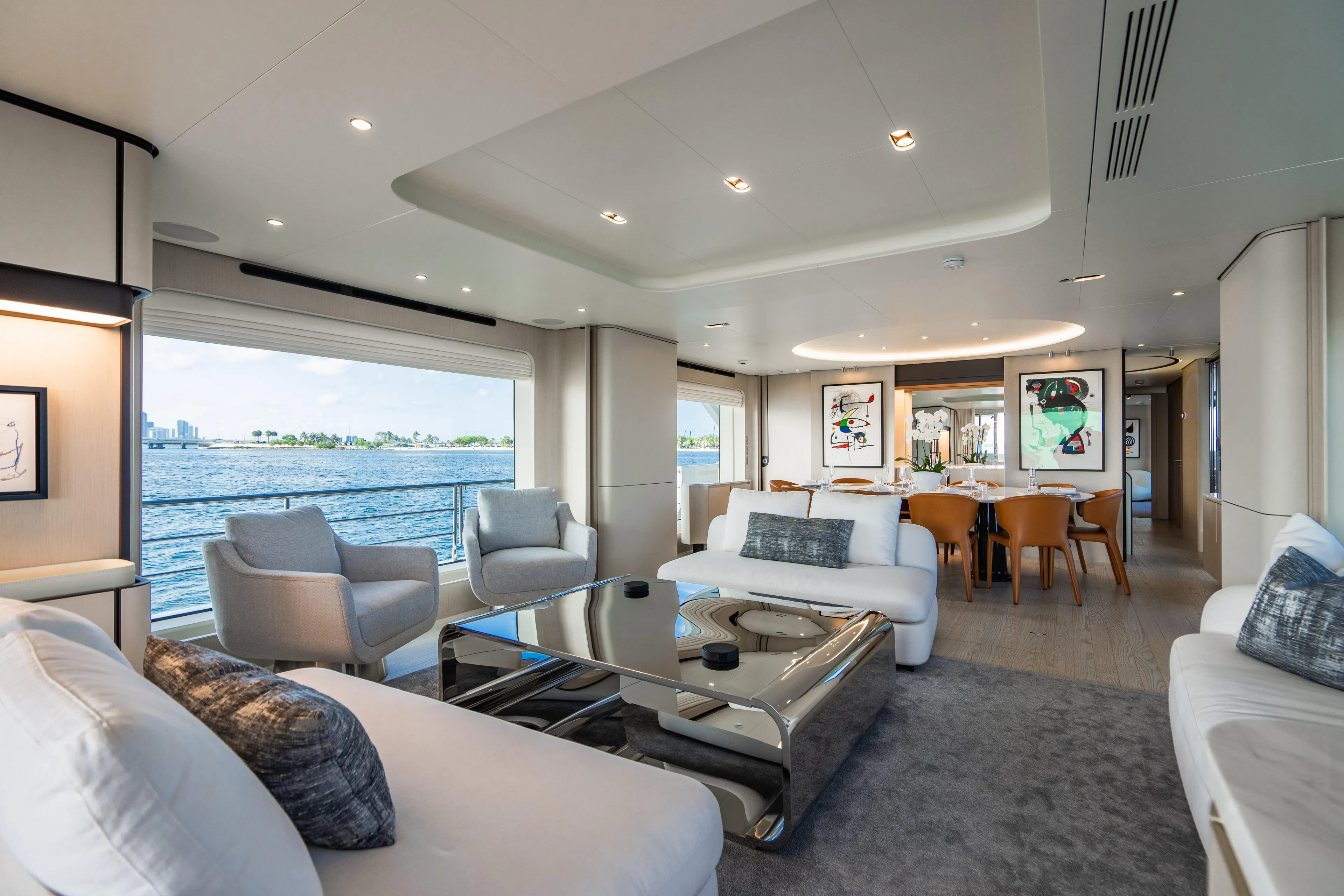 Carpe Diem Yacht Photos Pics Luxurious 2023 Azimut yacht interior with modern decor, spacious seating, and ocean view.