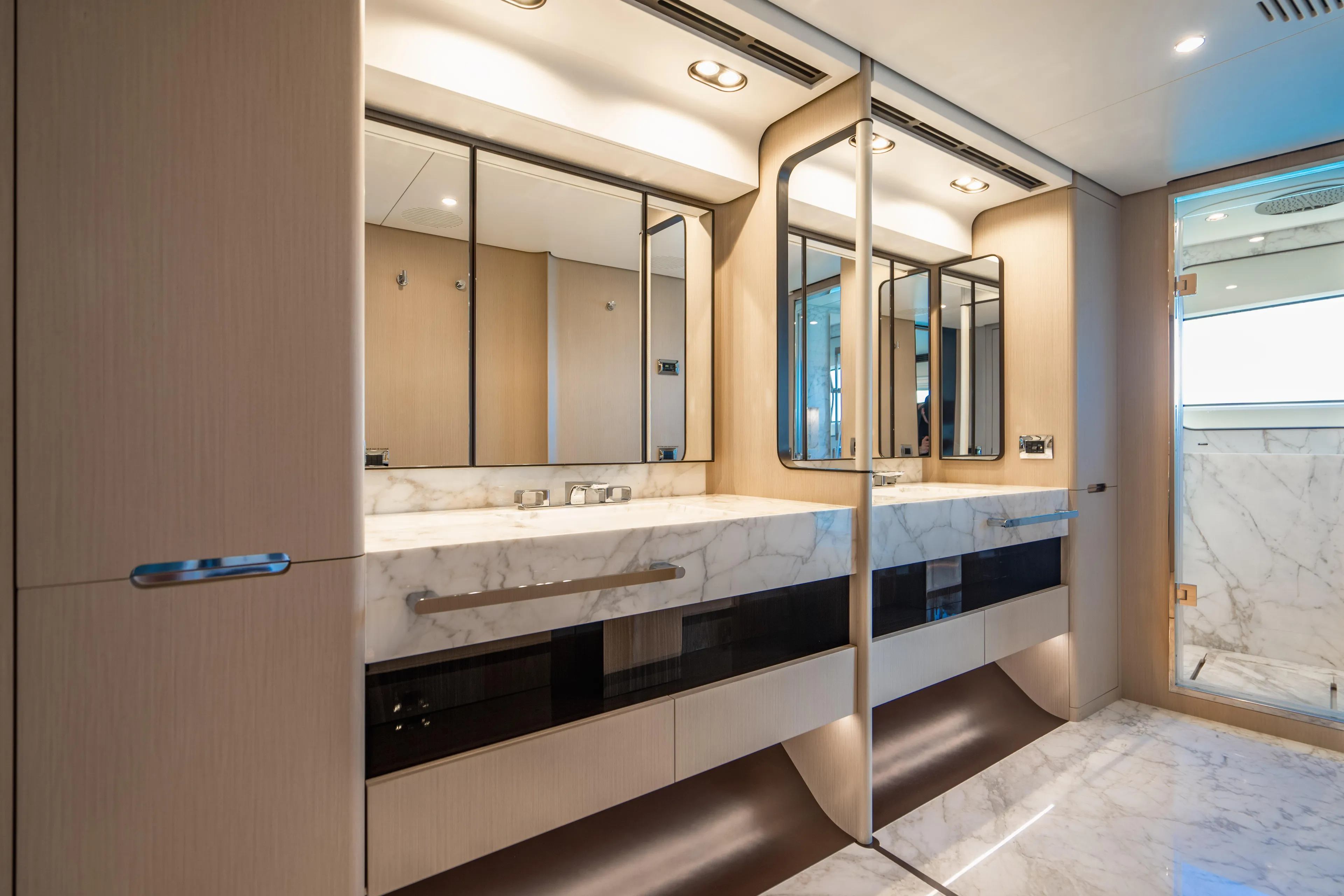 Carpe Diem Yacht Photos Pics Luxurious 2023 Azimut yacht bathroom with marble countertops and modern fixtures.