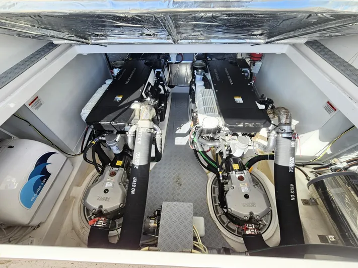 Rio 50 Yacht Photos Pics Engine room of 2024 Rio Yachts Daytona 50, showcasing dual engines and mechanical components.