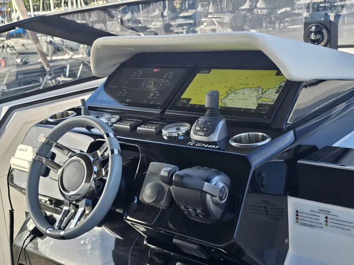 Rio 50 Yacht Photos Pics 2024 Rio Yachts Daytona 50 helm with advanced navigation displays and controls.