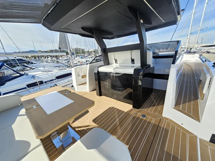 Rio 50 Yacht Photos Pics 2024 Rio Yachts Daytona 50 deck with modern seating and sleek design.
