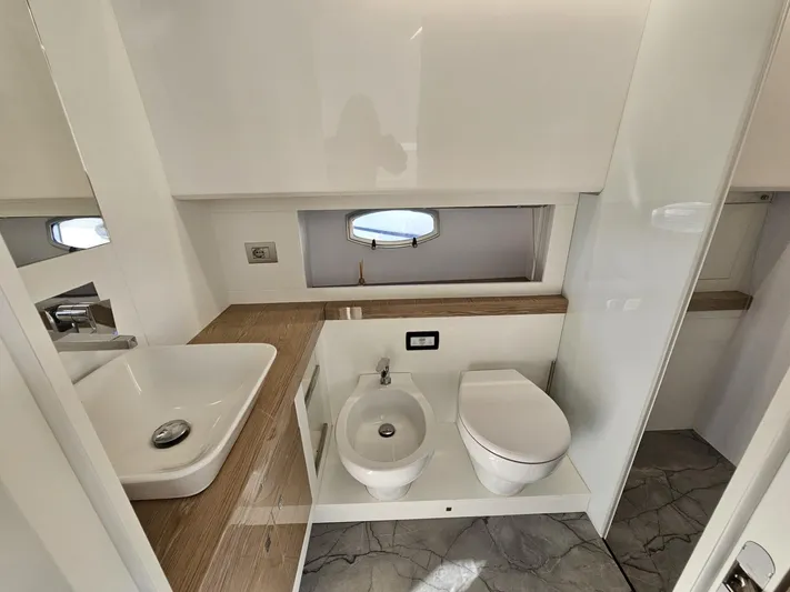 Rio 50 Yacht Photos Pics Luxurious bathroom in 2024 Rio Yachts Daytona 50, featuring modern fixtures and elegant design.