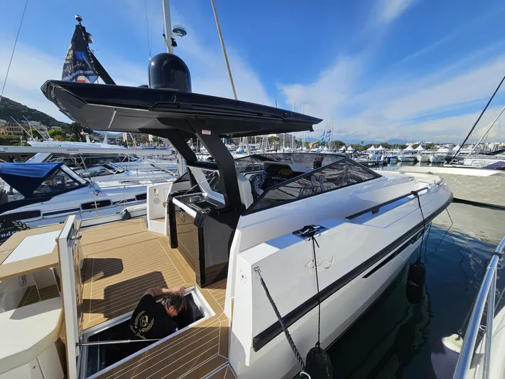 Rio 50 Yacht Photos Pics 2024 Rio Yachts Daytona 50 docked at marina, showcasing sleek design and modern features.