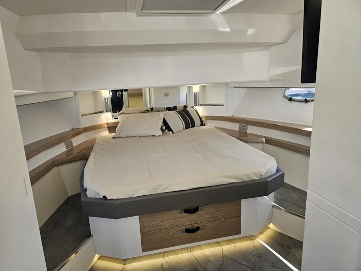 Rio 50 Yacht Photos Pics 2024 Rio Yachts Daytona 50 bedroom with modern design and ambient lighting.