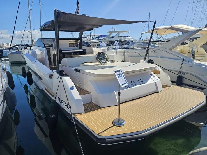 Rio 50 Yacht Photos Pics 2024 Rio Yachts Daytona 50 luxury yacht docked at marina, showcasing sleek design and spacious deck.