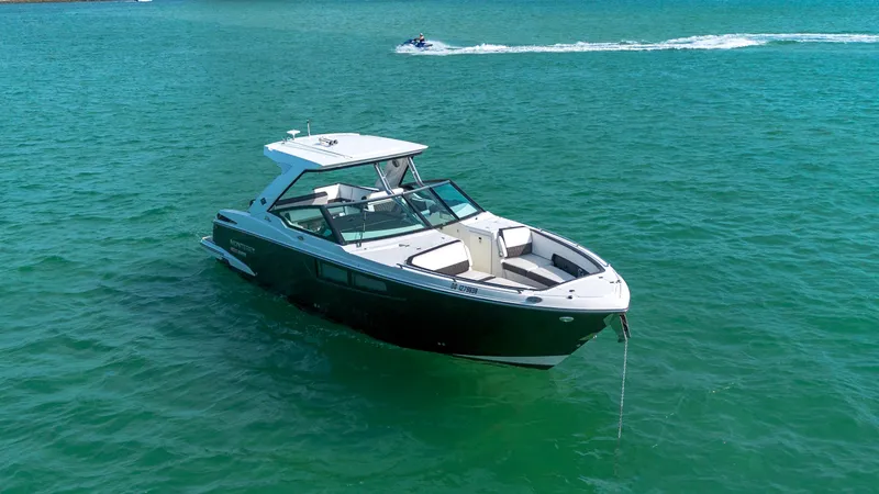 Fanta Sea Yacht Photos Pics 2018 Monterey 378 Super Express boat anchored on clear blue water.