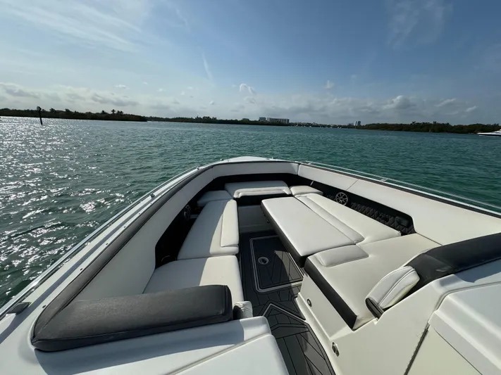 Fanta Sea Yacht Photos Pics Luxurious 2018 Monterey 378 Super Express boat interior with comfortable seating on a sunny day.