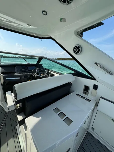 Fanta Sea Yacht Photos Pics 2018 Monterey 378 Super Express yacht interior with helm, seating, and ocean view.