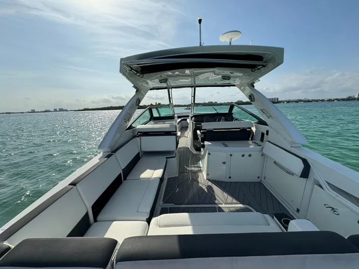 Fanta Sea Yacht Photos Pics 2018 Monterey 378 Super Express boat interior with spacious seating on calm water.