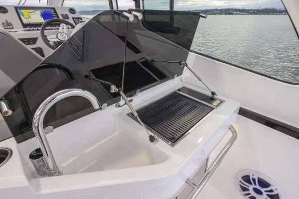 My Angel Yacht Photos Pics 2023 Beneteau GT32 yacht interior with sleek kitchen and modern amenities.