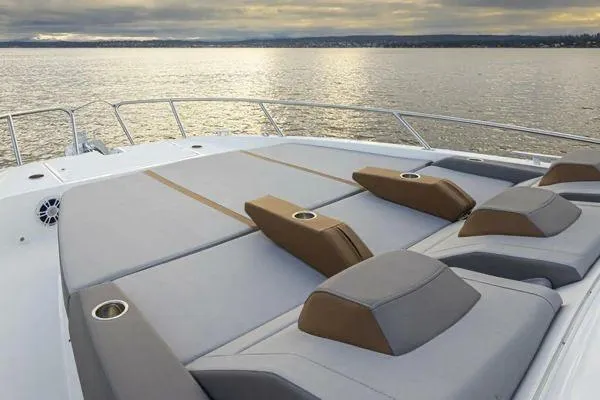 My Angel Yacht Photos Pics 2023 Beneteau GT32 yacht with spacious sunbathing deck on calm waters.