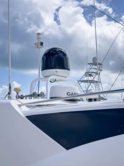  Yacht Photos Pics 2012 Riviera 50SY yacht with Garmin equipment against a cloudy sky.