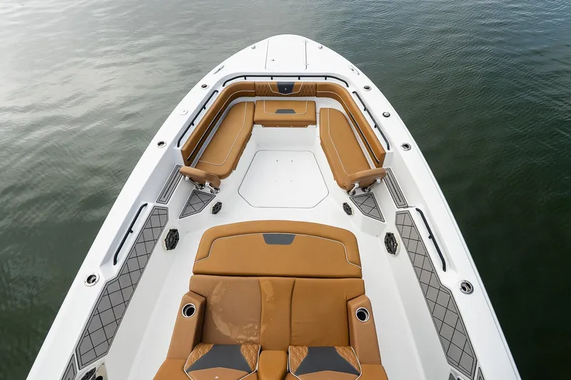  Yacht Photos Pics 2021 Wellcraft 402 Fisherman boat with tan seating on calm water.