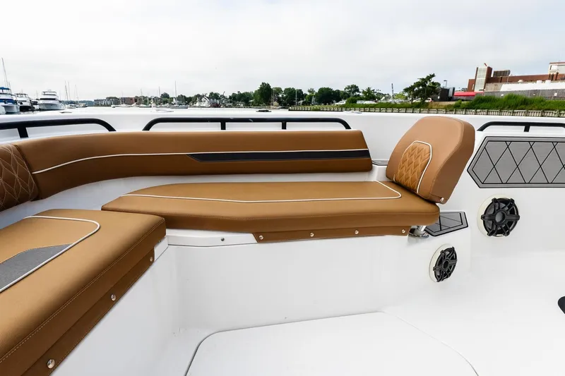  Yacht Photos Pics 2021 Wellcraft 402 Fisherman boat interior with tan seating and modern design.