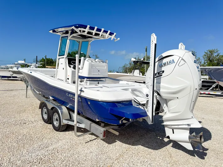  Yacht Photos Pics 2024 Caymas 28 HB boat with Yamaha outboard engine on trailer.
