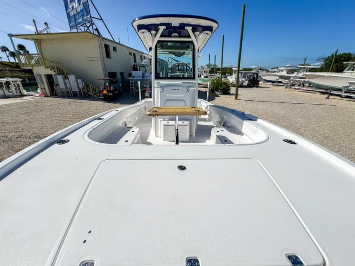  Yacht Photos Pics 2024 Caymas 28 HB boat with spacious deck and center console.