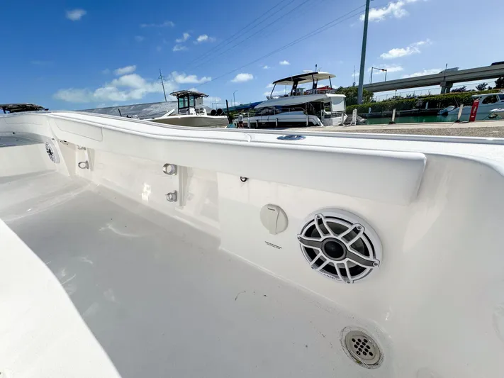  Yacht Photos Pics 2024 Caymas 28 HB boat interior with white finish and speaker system.