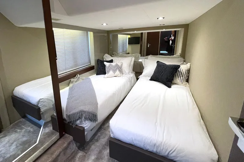  Yacht Photos Pics Luxurious twin bedroom in 2015 Fairline Targa 62 GT yacht.