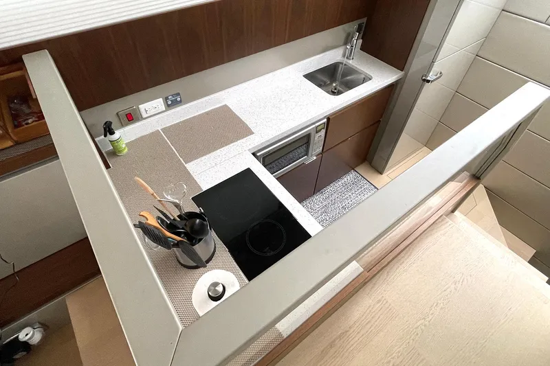  Yacht Photos Pics Modern kitchen in 2015 Fairline Targa 62 GT yacht with sleek design and appliances.
