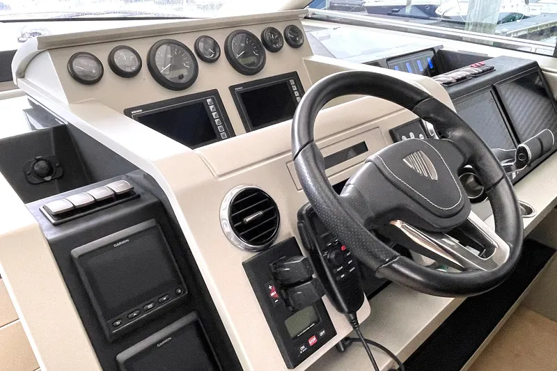  Yacht Photos Pics Fairline Targa 62 GT 2015 yacht helm with modern controls and steering wheel.