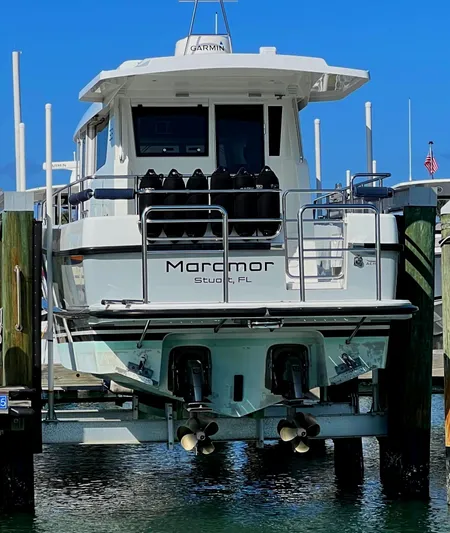 Maramor Yacht Photos Pics 2019 Sargo 33 All Season boat docked, rear view, with dual propellers visible.