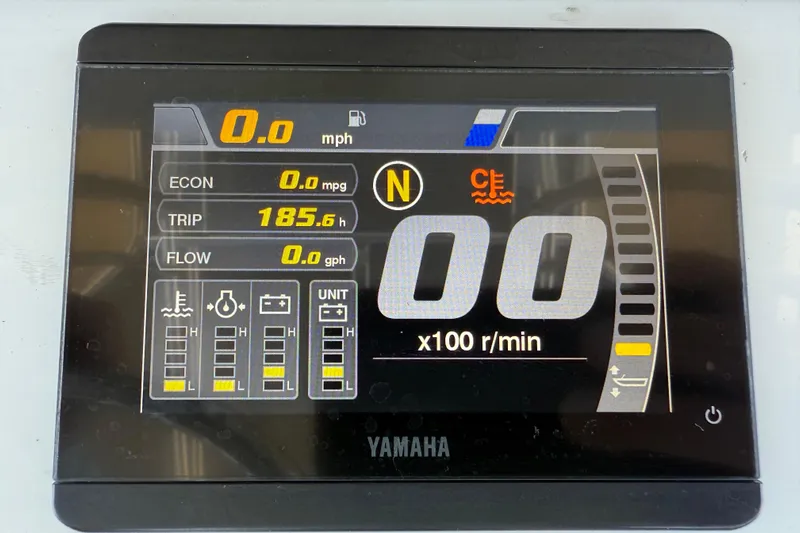  Yacht Photos Pics Yamaha display on 2024 Contender 26 Bay showing speed, economy, trip, and flow metrics.