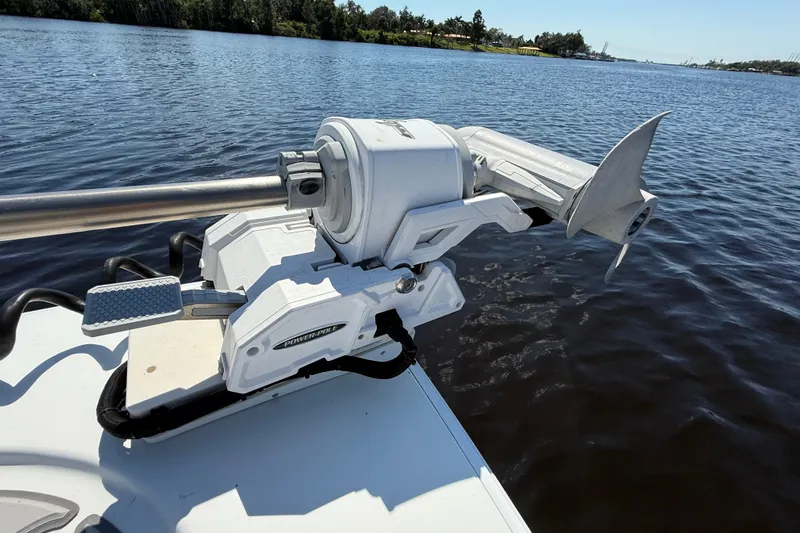  Yacht Photos Pics 2024 Contender 26 Bay boat with Power-Pole anchor system on a calm river.