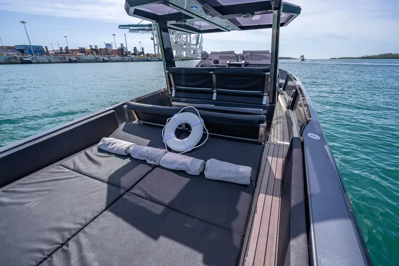  Yacht Photos Pics Wally 43 yacht, 2012 model, with spacious deck and seating, cruising on calm waters.