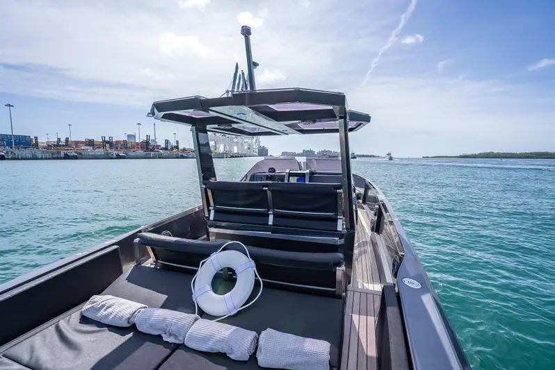  Yacht Photos Pics Luxury Wally 43 yacht cruising on open water, 2012 model, sunny day.