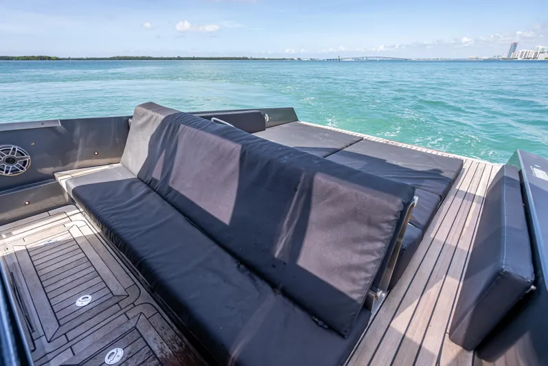  Yacht Photos Pics Luxury Wally 43 yacht deck with seating, 2012 model, overlooking serene ocean waters.