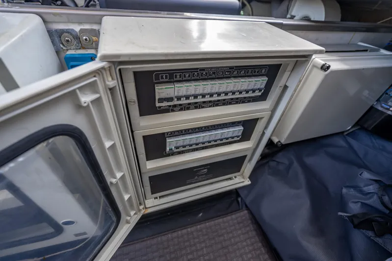  Yacht Photos Pics Electrical panel inside a 2012 Wally 43 boat, showing circuit breakers and wiring.