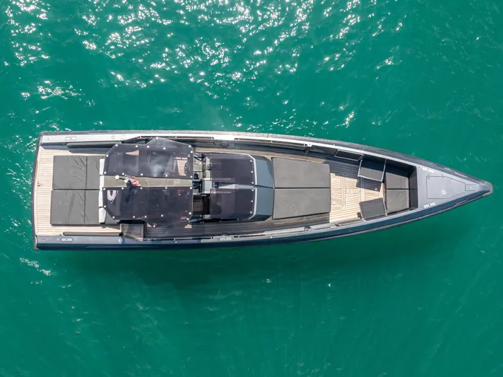  Yacht Photos Pics Aerial view of 2012 Wally 43 yacht on turquoise water.