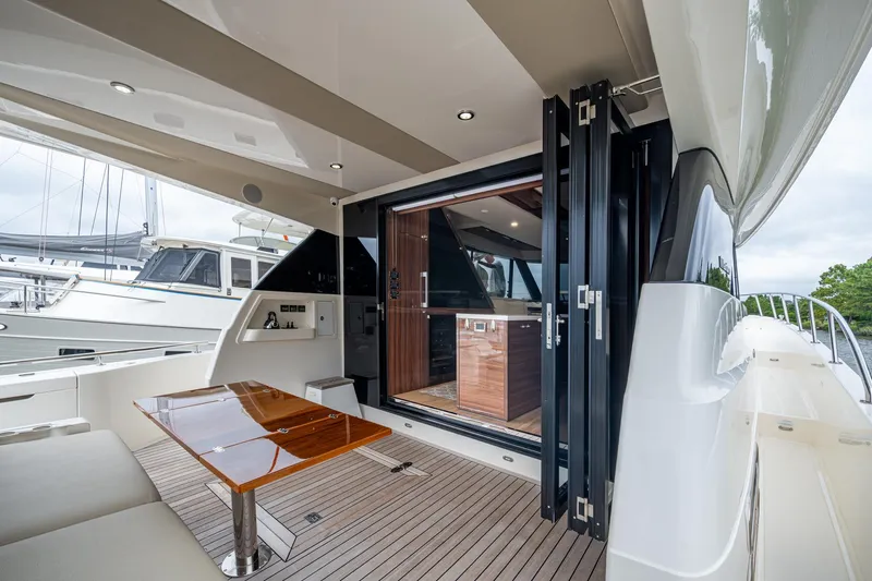 Norfolk Girl Yacht Photos Pics 2023 Maritimo M55 yacht with elegant deck and modern interior design.