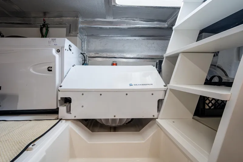 Norfolk Girl Yacht Photos Pics Engine room of 2023 Maritimo M55 yacht featuring Seakeeper stabilizer system.