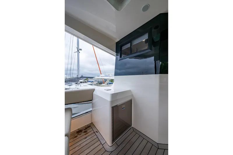 Norfolk Girl Yacht Photos Pics 2023 Maritimo M55 yacht deck with sleek design and modern amenities.