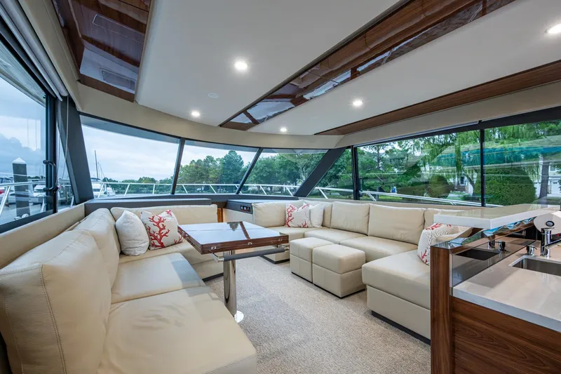 Norfolk Girl Yacht Photos Pics Luxurious interior of 2023 Maritimo M55 yacht with spacious seating and modern design.