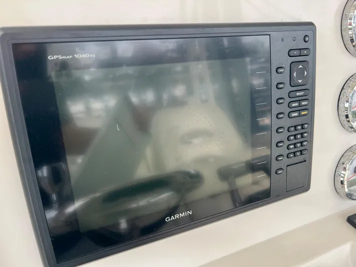 Mystic Wench Yacht Photos Pics Garmin GPSmap 1040xs on 2014 Sailfish 290 CC boat dashboard.