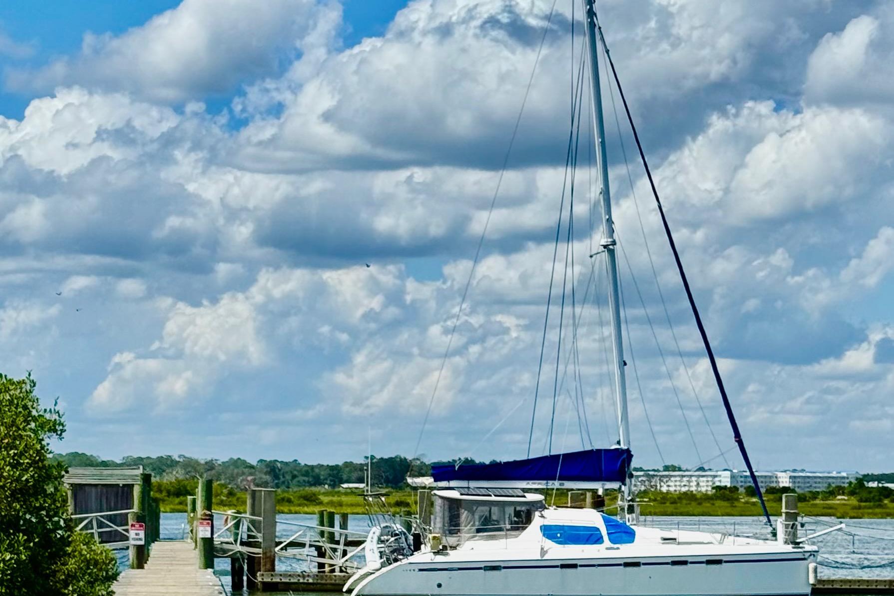 Sailboat Privilege 49 docked under a cloudy sky, 2004 model.