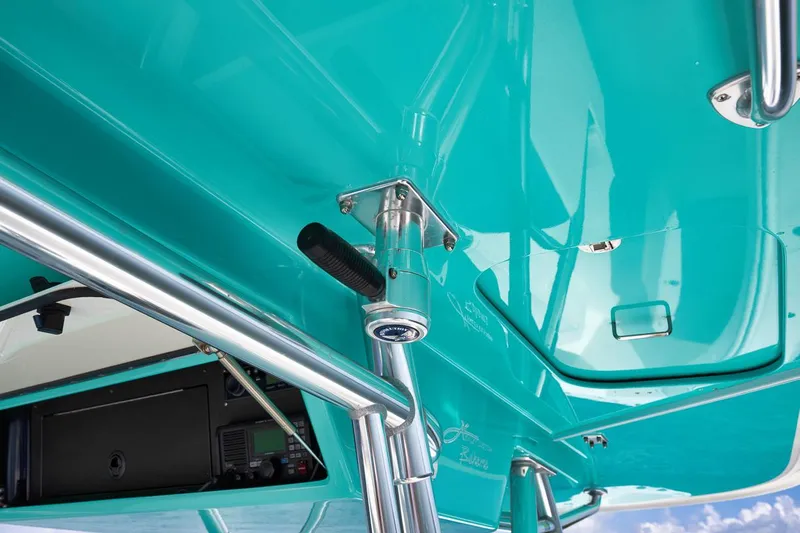 Baby Blues Yacht Photos Pics Close-up of a 2013 Bahama 37 boat's teal structure and stainless steel fittings.
