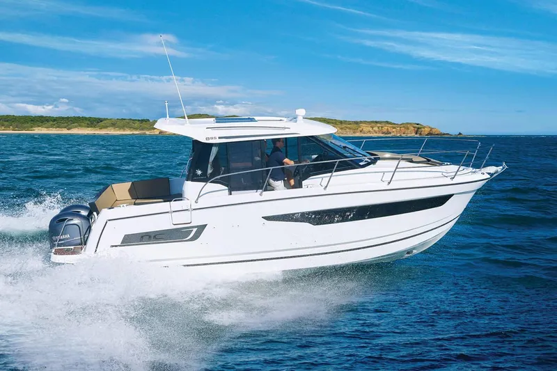  Yacht Photos Pics Manufacturer Provided Image: 2022 Jeanneau NC Weekender 895 cruising on open water.