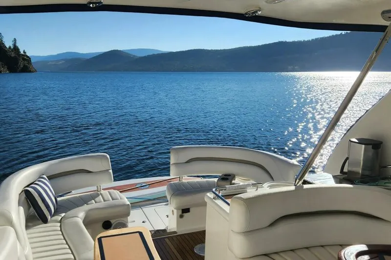  Yacht Photos Pics Luxurious 2005 Doral Alegria yacht interior with scenic lake and mountain view.