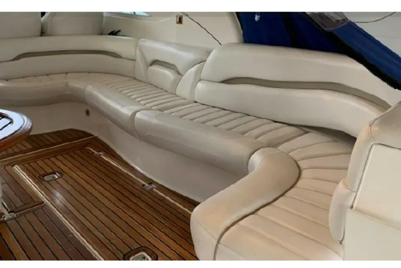  Yacht Photos Pics Luxurious interior seating of 2005 Doral Alegria yacht with wooden flooring.