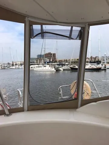 Que Sera Yacht Photos Pics View from a 2009 Prout 45S yacht overlooking a marina with sailboats.