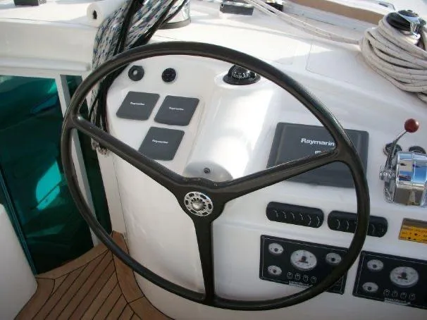 Que Sera Yacht Photos Pics Steering wheel and controls of a 2009 Prout 45S yacht.