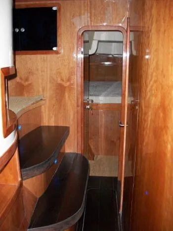 Que Sera Yacht Photos Pics Interior of 2009 Prout 45S yacht with wooden finishes and cabin view.